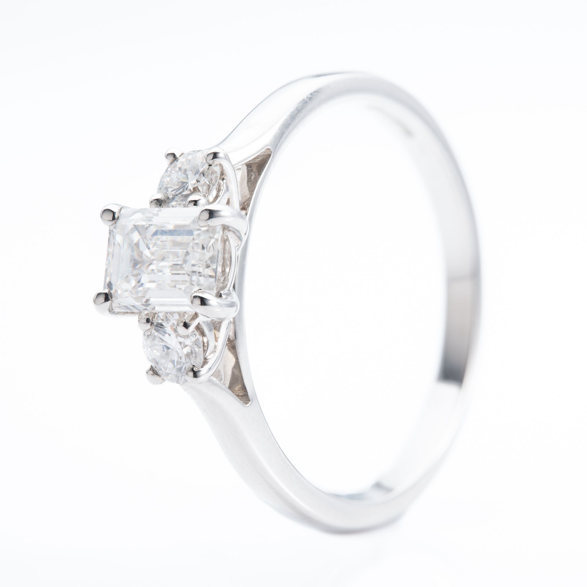 Platinum & Diamond Emerald Cut and Brilliant Cut Trilogy Ring