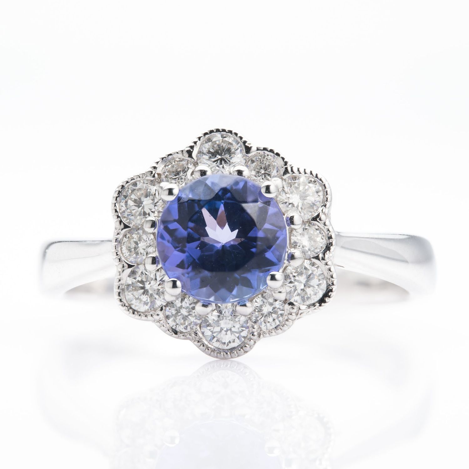 Platinum Round Cut Tanzanite & Round Brilliant Cut Diamond Cluster Ring