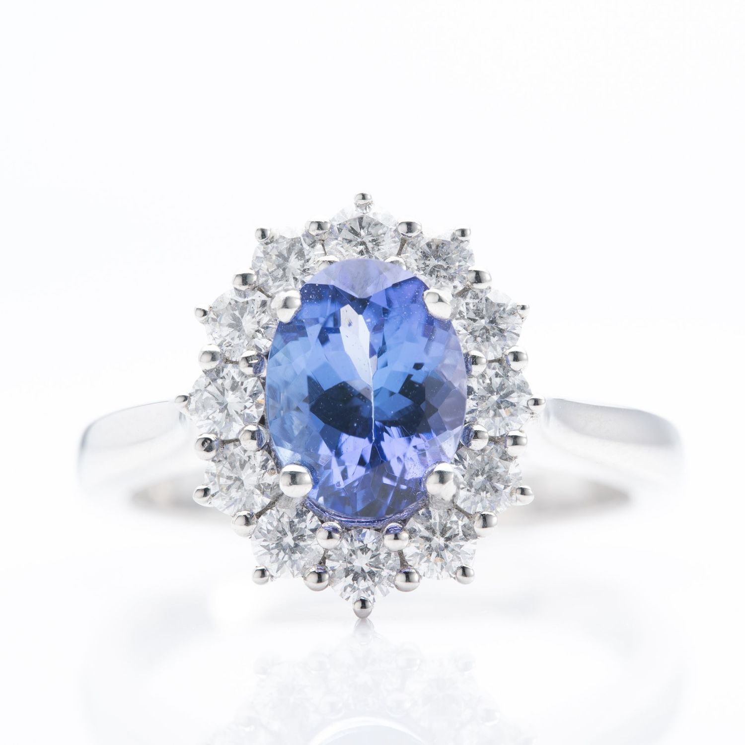 Platinum Oval Cut Tanzanite & Round Brilliant Cut Diamond Cluster Ring
