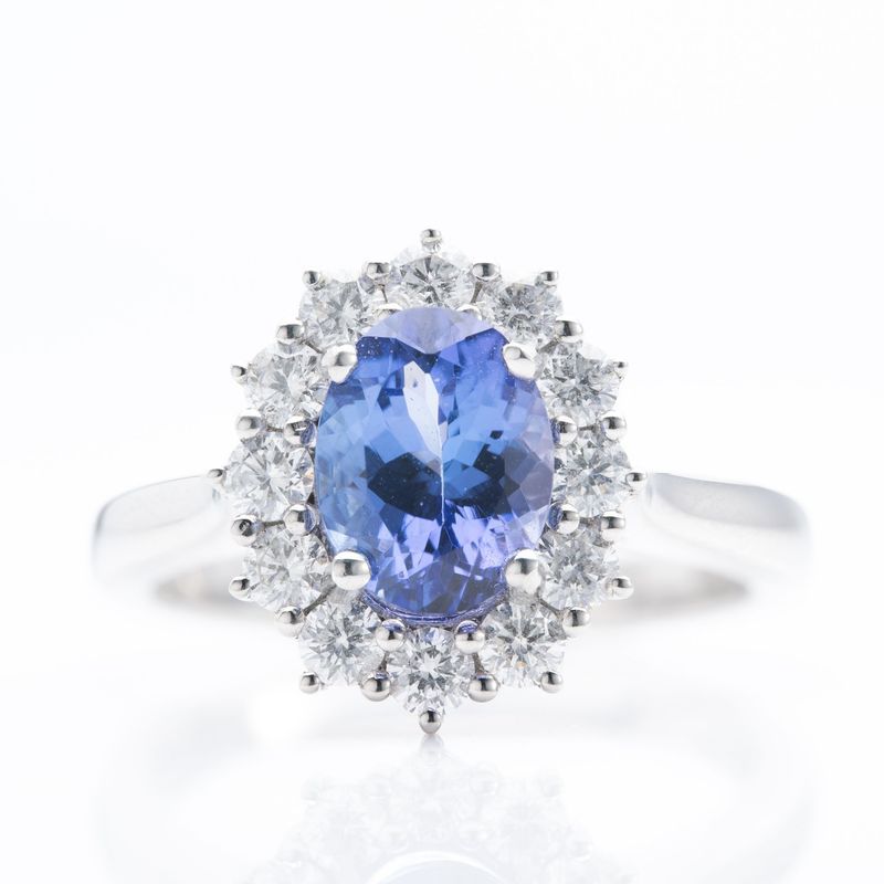 Platinum Oval Cut Tanzanite & Round Brilliant Cut Diamond Cluster Ring