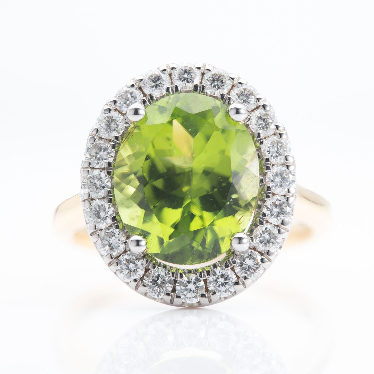 18ct Gold Oval Cut Peridot & Round Brilliant Cut Diamond Halo Cluster Ring