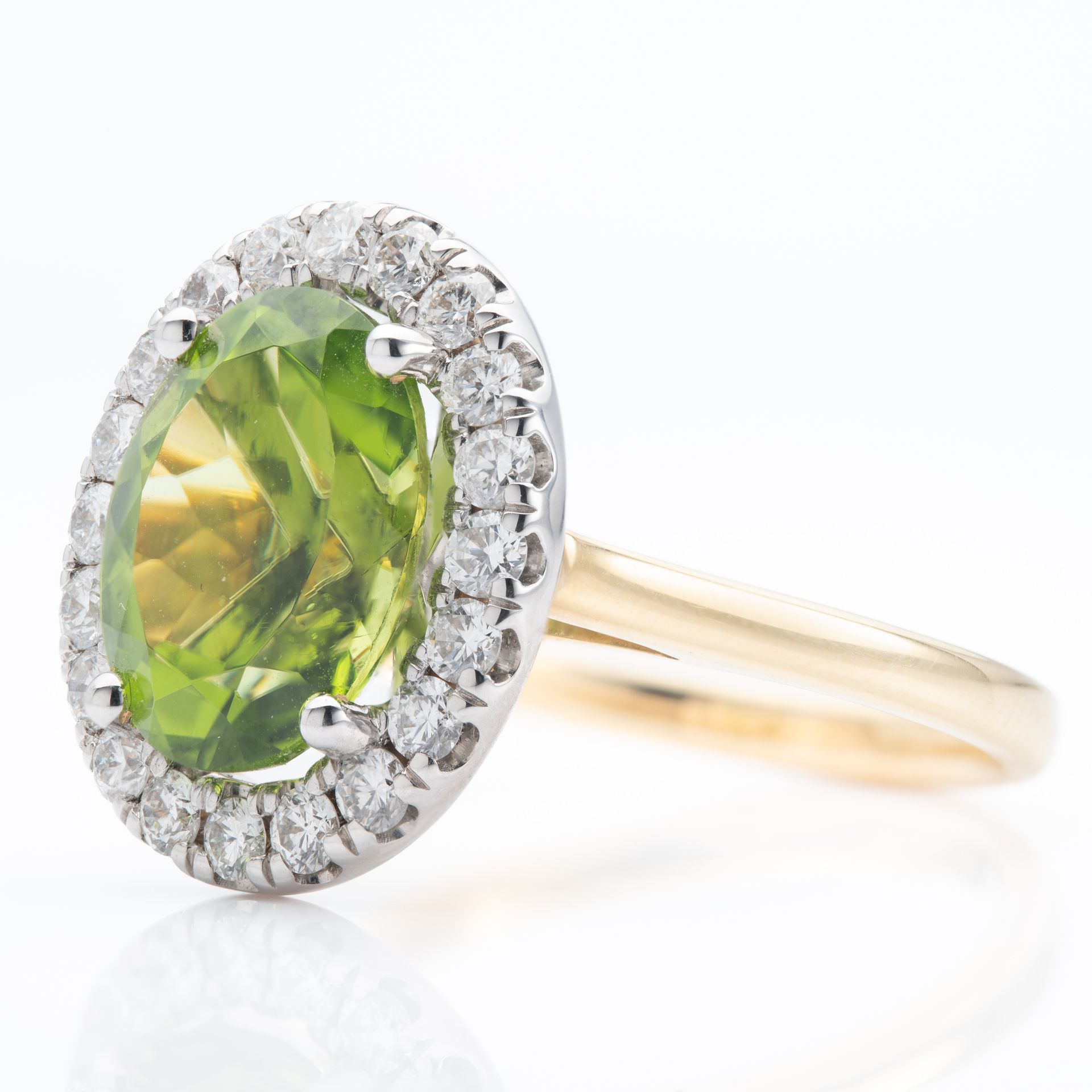 18ct Gold Oval Cut Peridot & Round Brilliant Cut Diamond Halo Cluster Ring