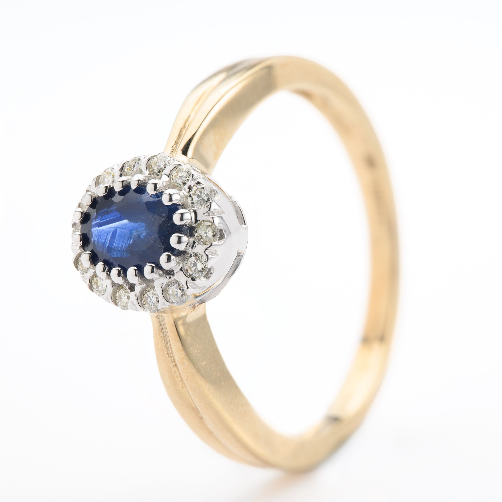 9ct Gold Oval Cut Sapphire & Round Brilliant Cut Diamond Halo Cluster Ring