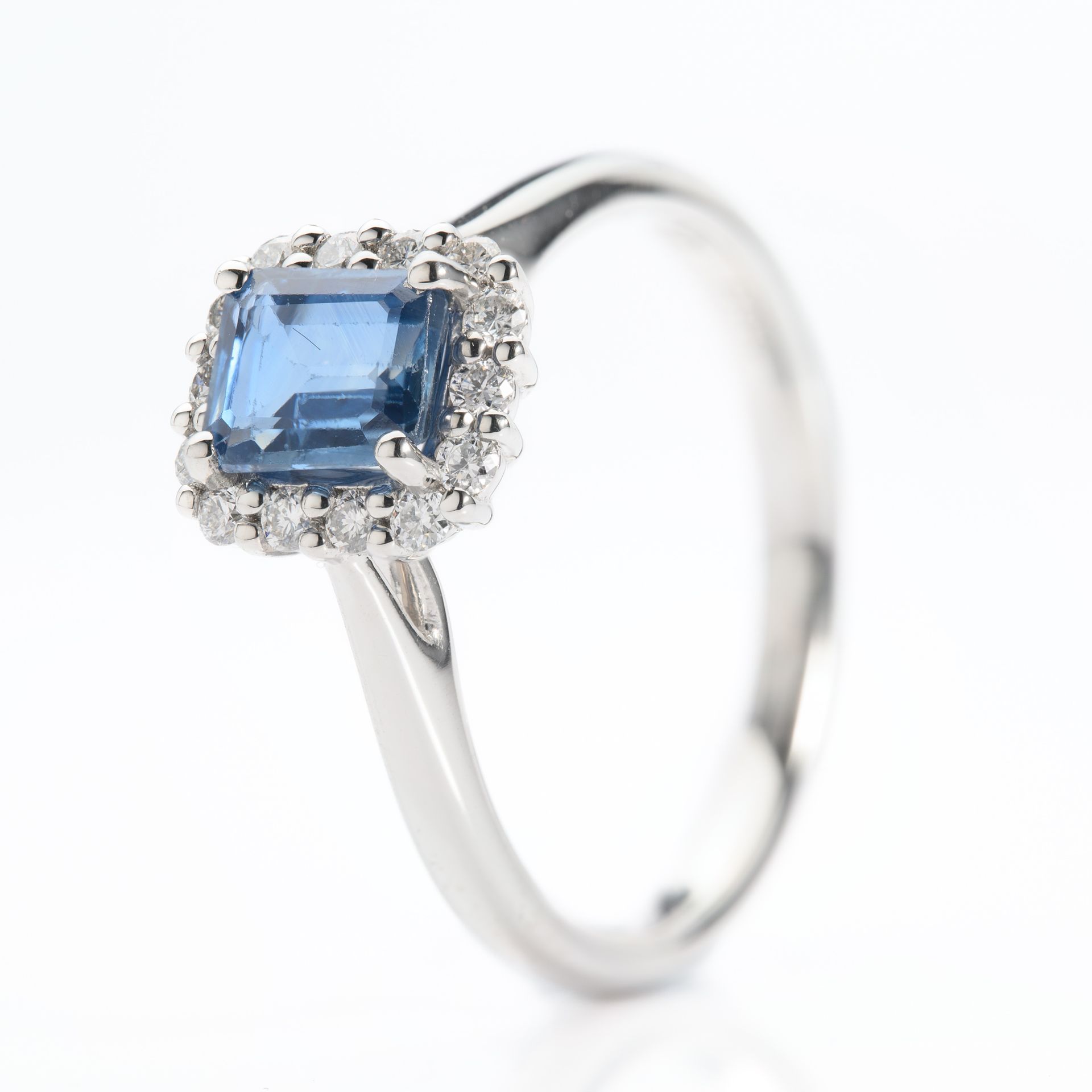 Platinum Octagonal Cut Sapphire & Round Brilliant Cut Diamond Halo Cluster Ring