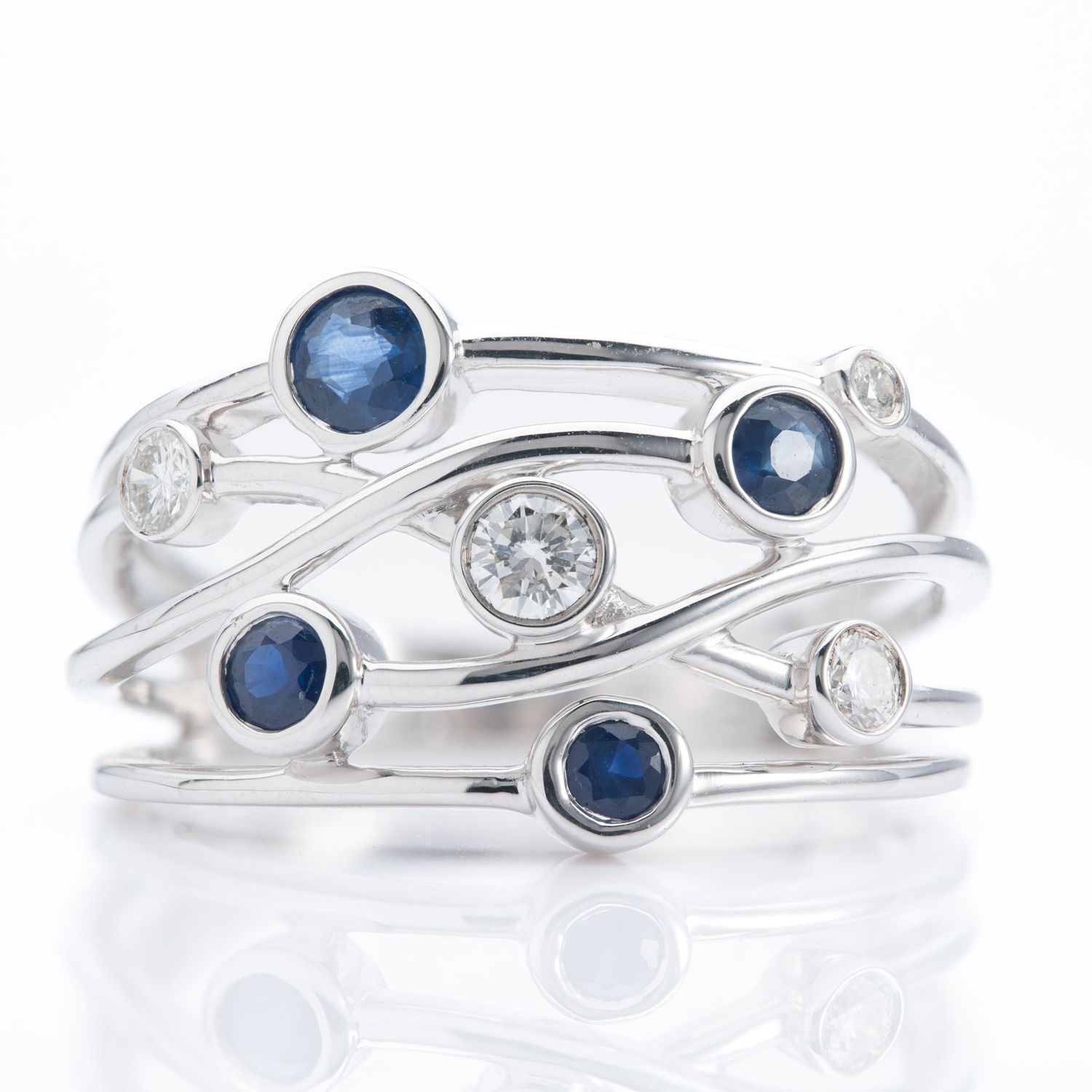 9ct White Gold Round Cut Sapphire & Brilliant Cut Diamond Bubble Ring 9ct White Gold Round Cut Sapphire & Brilliant Cut Diamond Bubble Ring