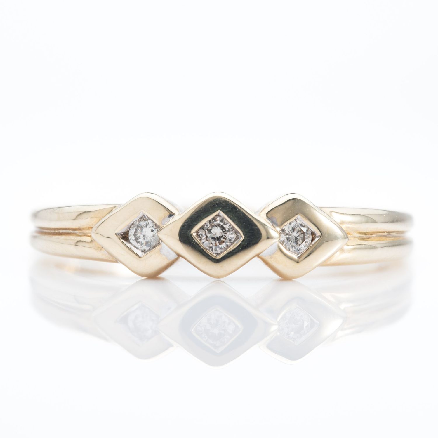 9ct Yellow Gold Rub Over Set Diamond Trilogy Ring 9ct Yellow Gold Rub Over Set Diamond Trilogy Ring