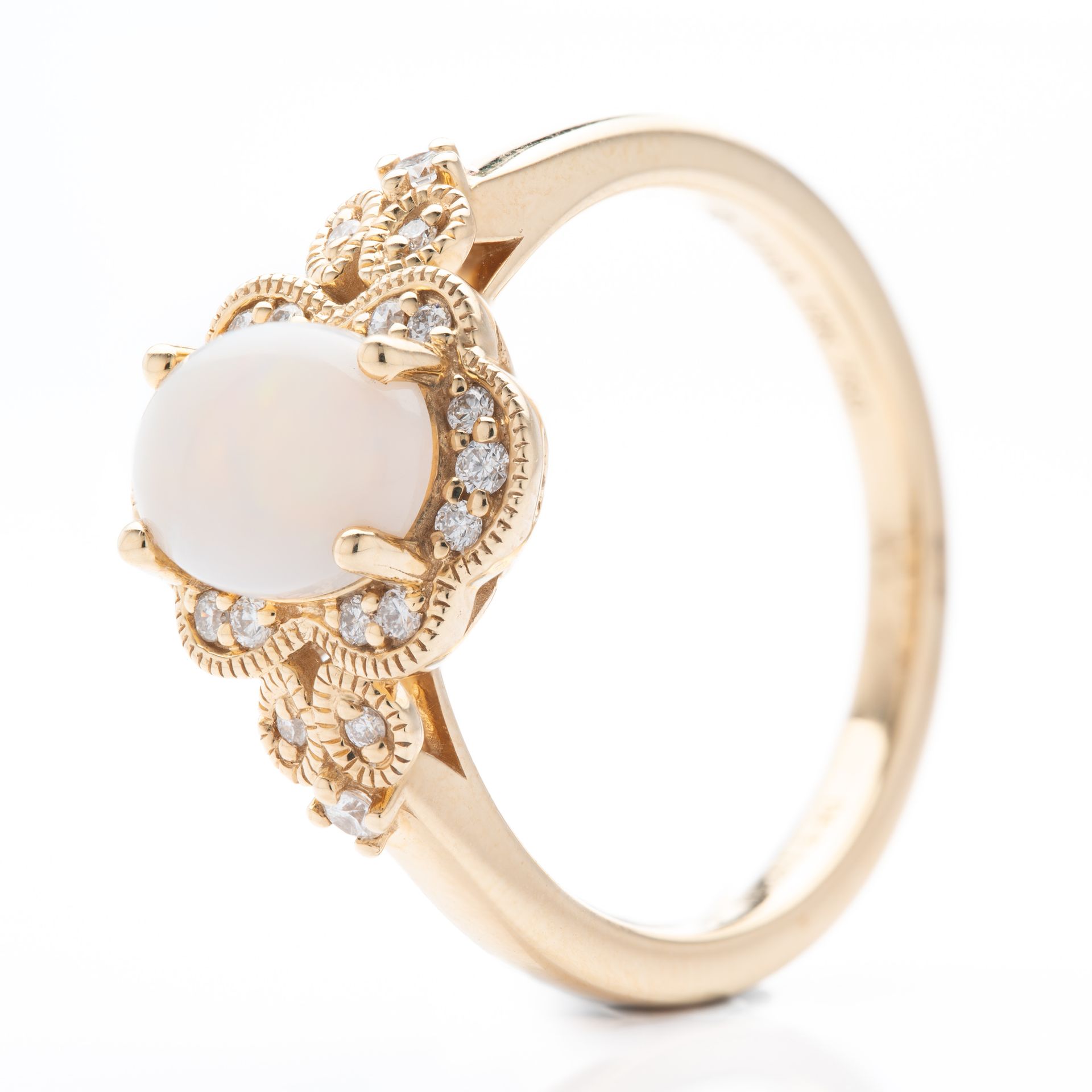 18ct Yellow Gold Oval Cut Opal and Brilliant Cut Diamond Ring