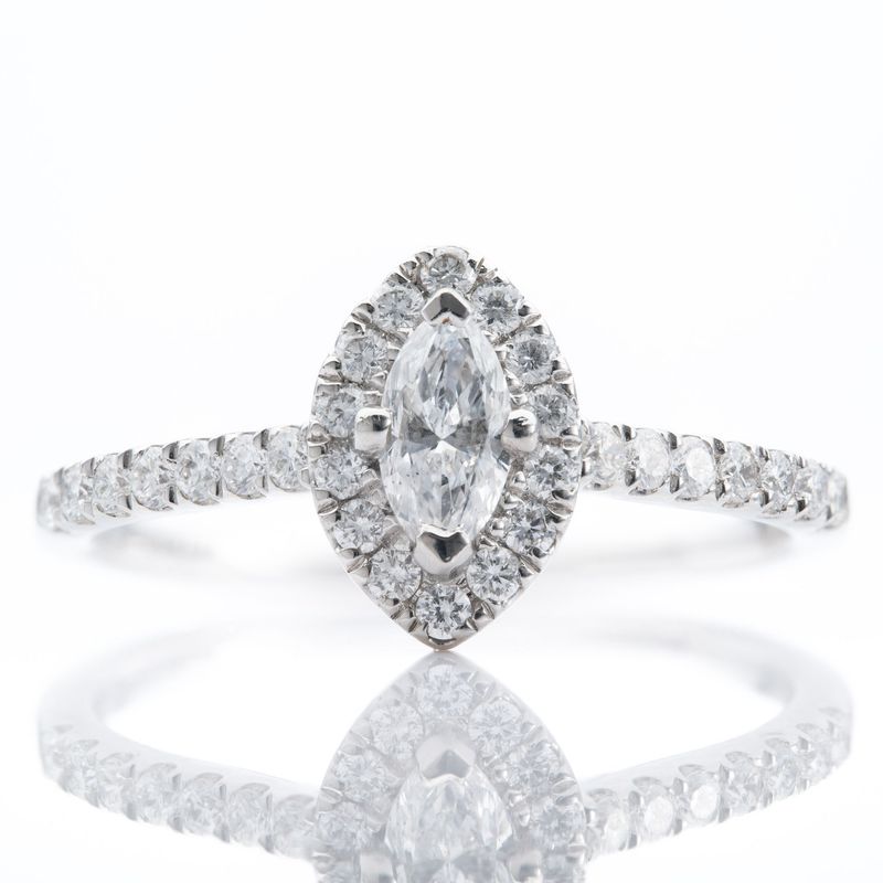 Platinum 0.24ct F SI1 Marquise Cut Diamond Halo Cluster Ring