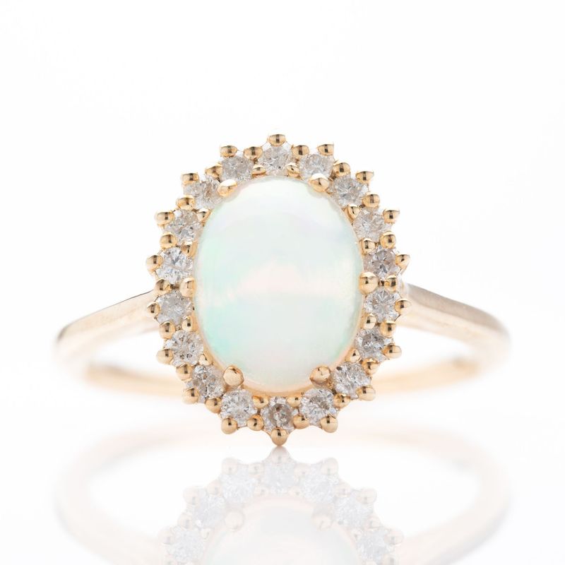 9ct Yellow Gold Oval Cut Opal and Round Brilliant Cut Diamond Cluster Ring
