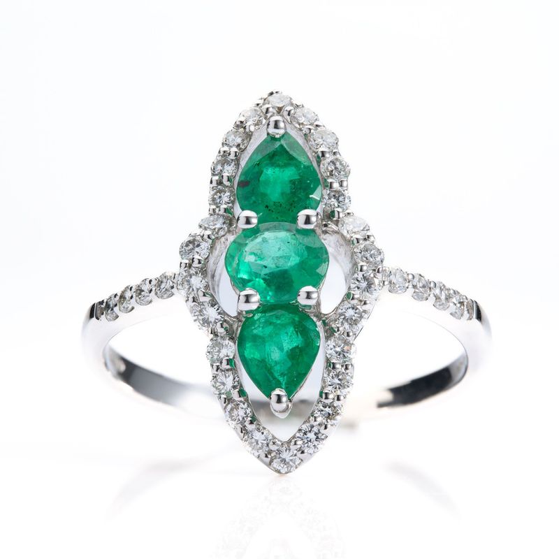 18ct White Gold Marquise Shaped Emerald & Diamond Triple Halo ring