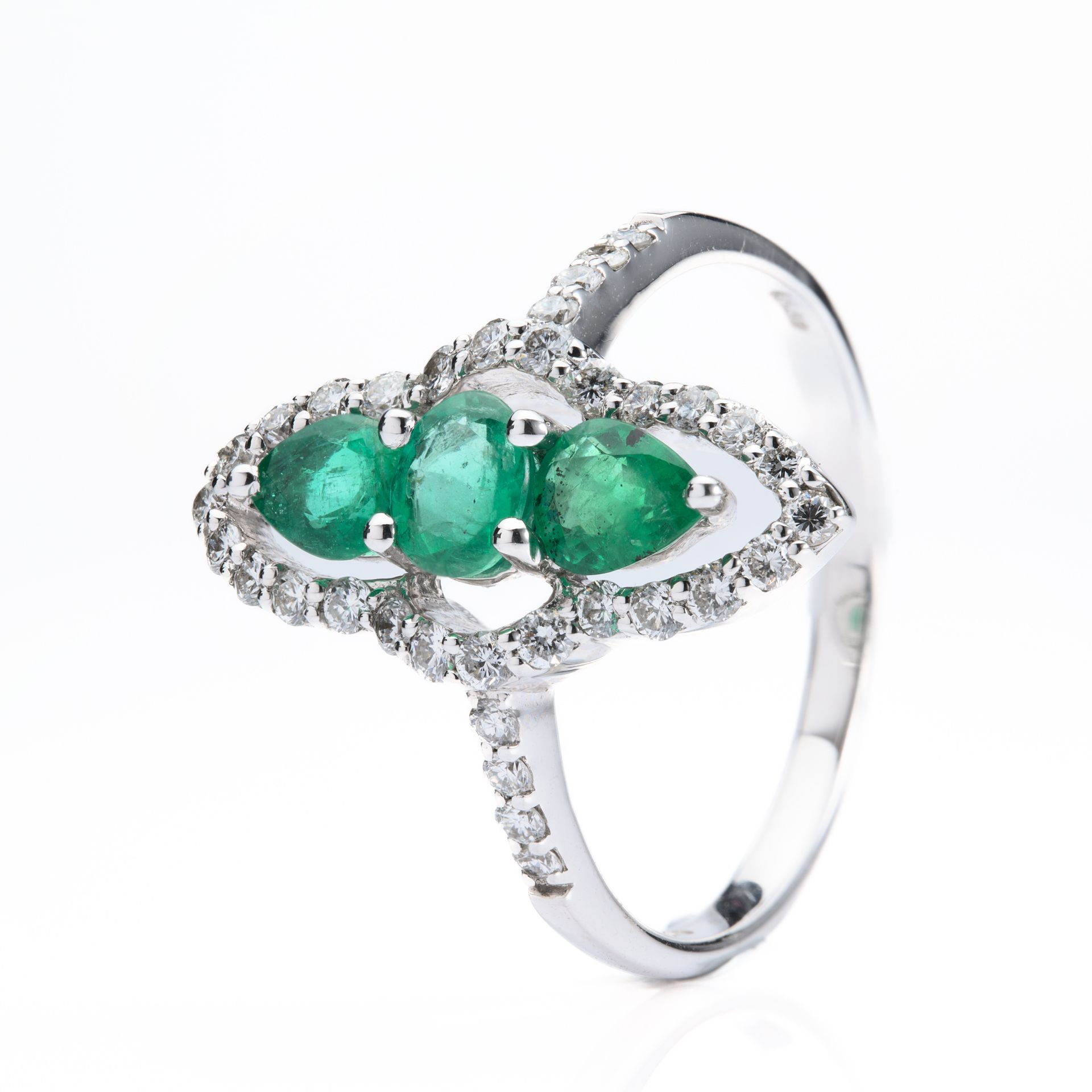 18ct White Gold Marquise Shaped Emerald & Diamond Triple Halo ring