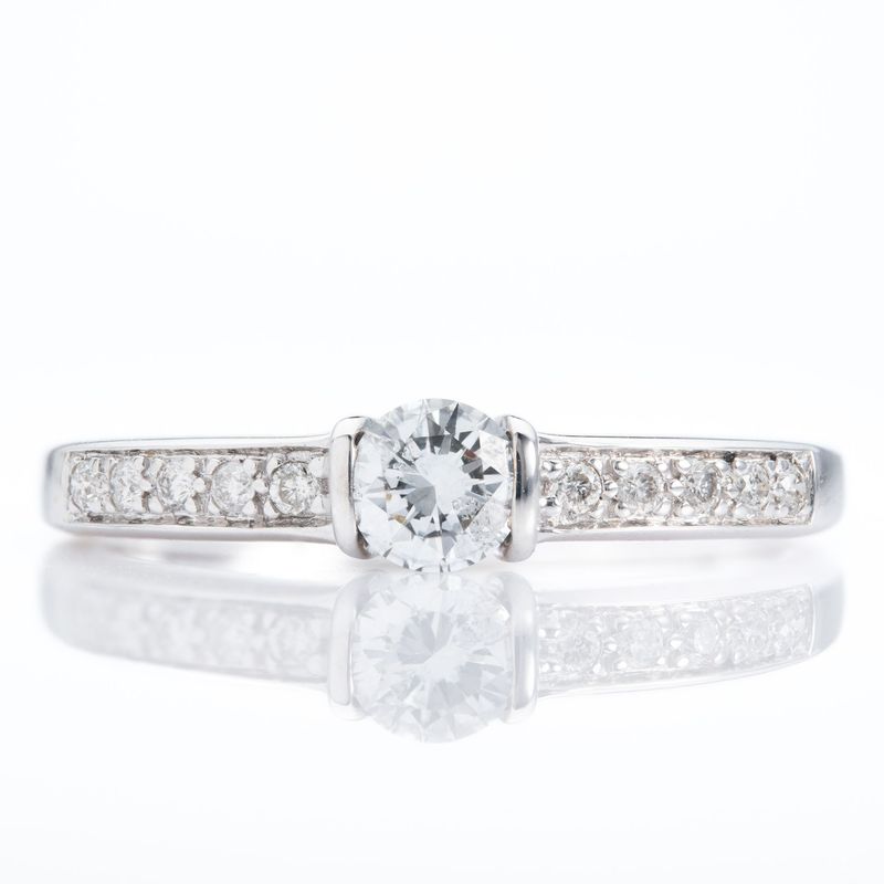 18ct White Gold Tension Set Round Brilliant Cut Diamond ring with Diamond Shoulders