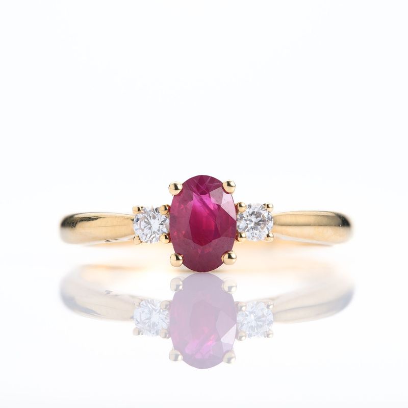 18ct Yellow Gold Oval Cut Ruby & Round Brilliant Cut Diamond Trilogy Ring
