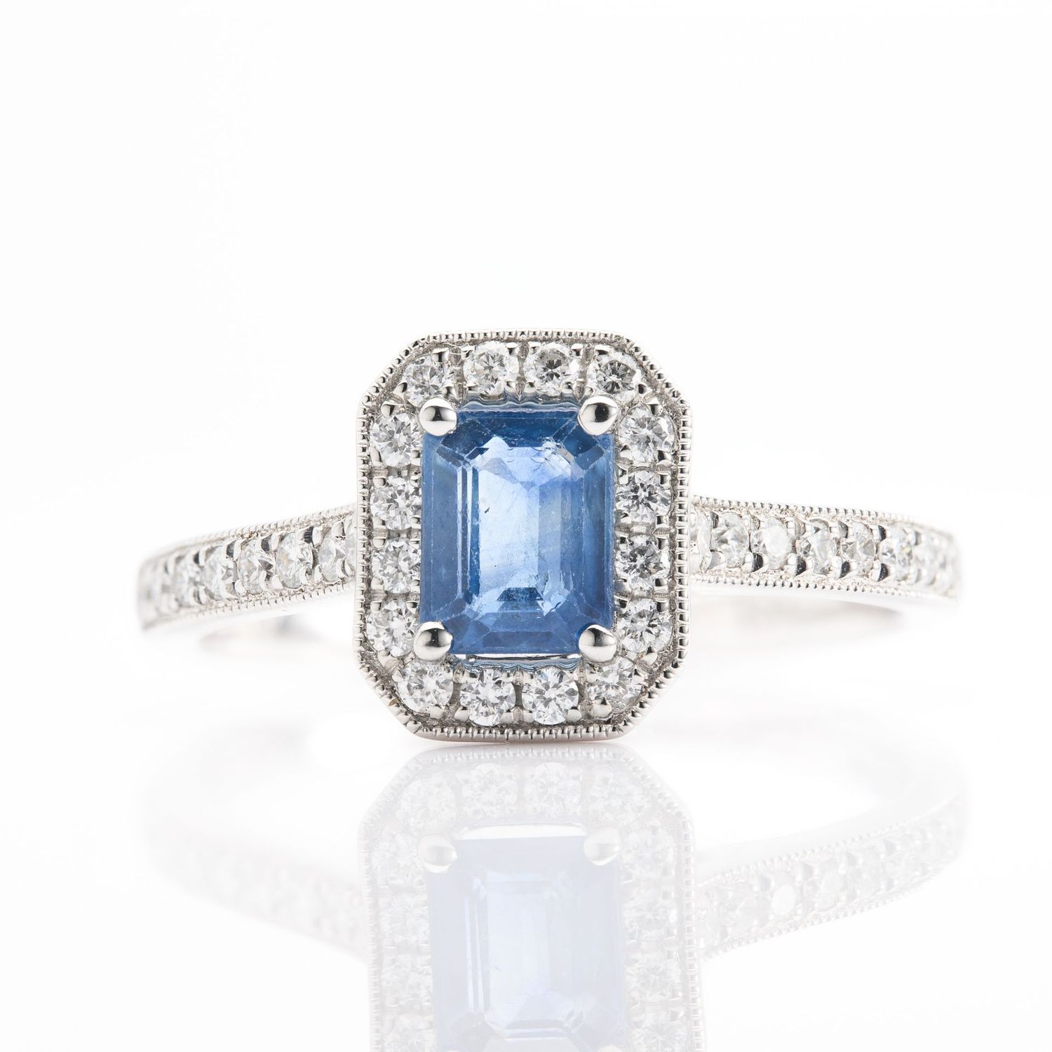 Platinum Emerald Cut Sapphire and Round Brilliant Cut Diamond Ring Platinum Emerald Cut Sapphire and Round Brilliant Cut Diamond Ring