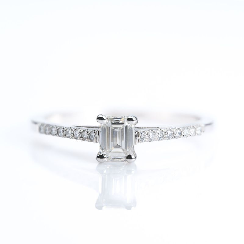 Platinum GIA Certified Emerald Cut Diamond Solitaire Ring with Diamond Set Shoulders