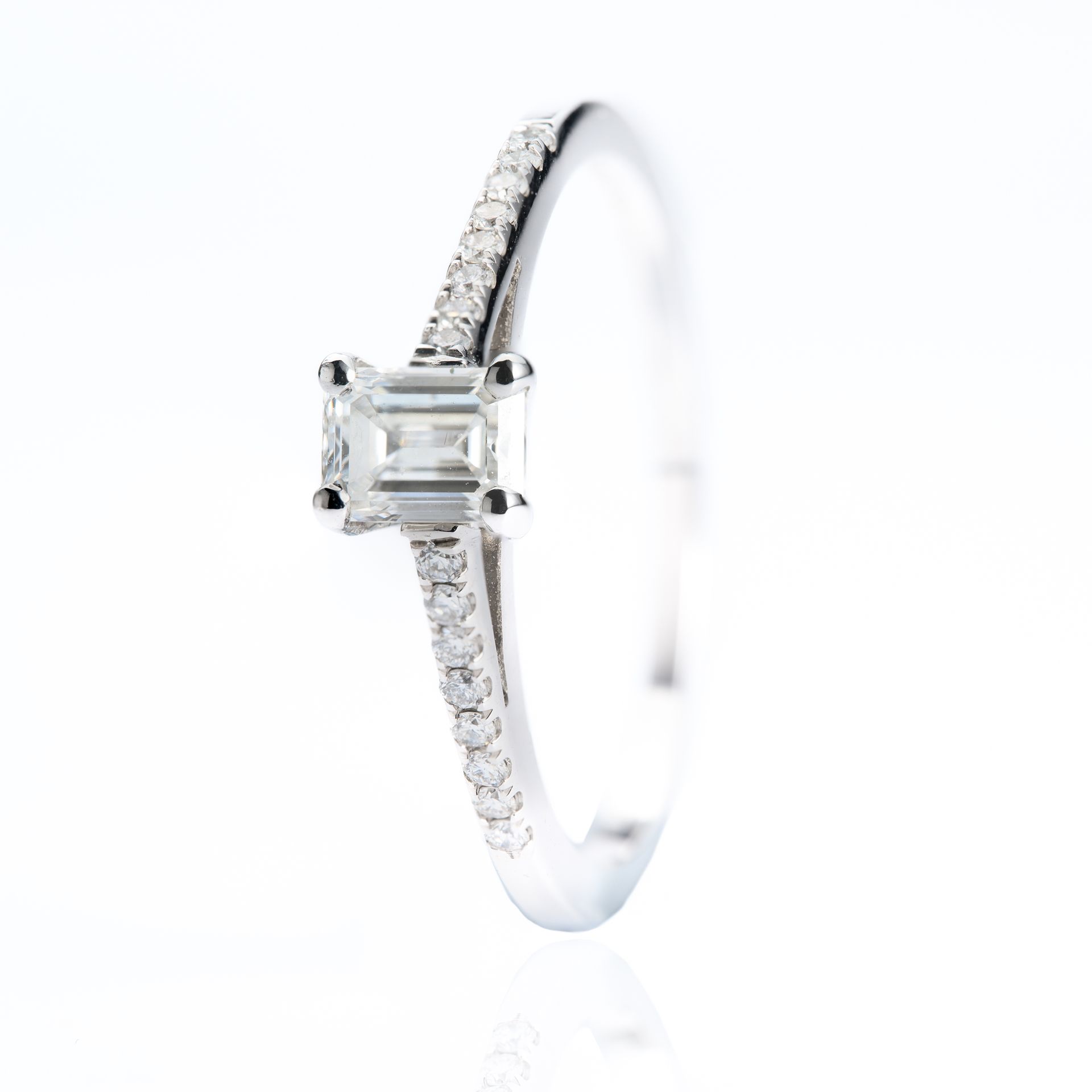 Platinum GIA Certified Emerald Cut Diamond Solitaire Ring with Diamond Set Shoulders