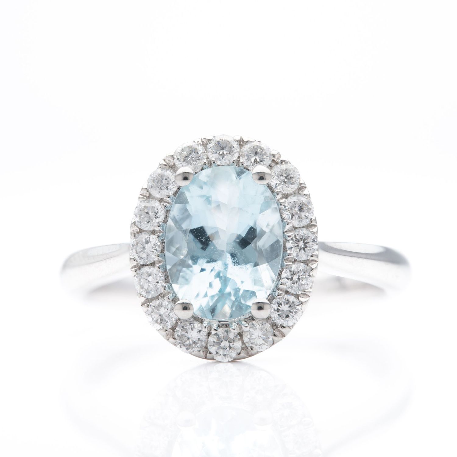 Platinum Oval Cut Aquamarine and Brilliant Cut Diamond Cluster Ring