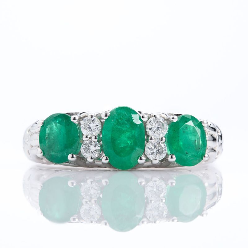 Platinum Oval Cut Emerald & Round Brilliant Cut Diamond 7-Stone Ring