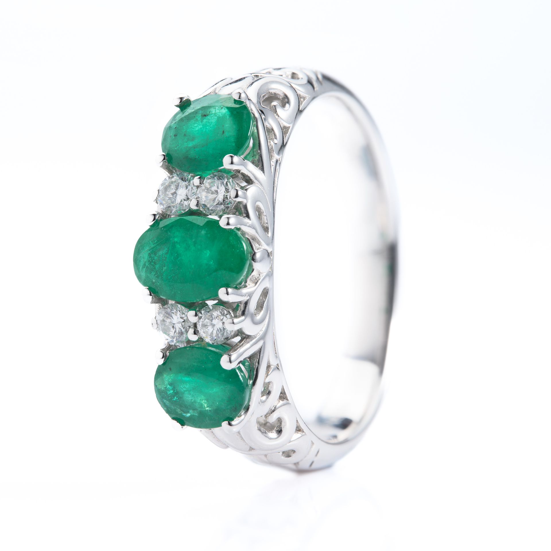 Platinum Oval Cut Emerald & Round Brilliant Cut Diamond 7-Stone Ring
