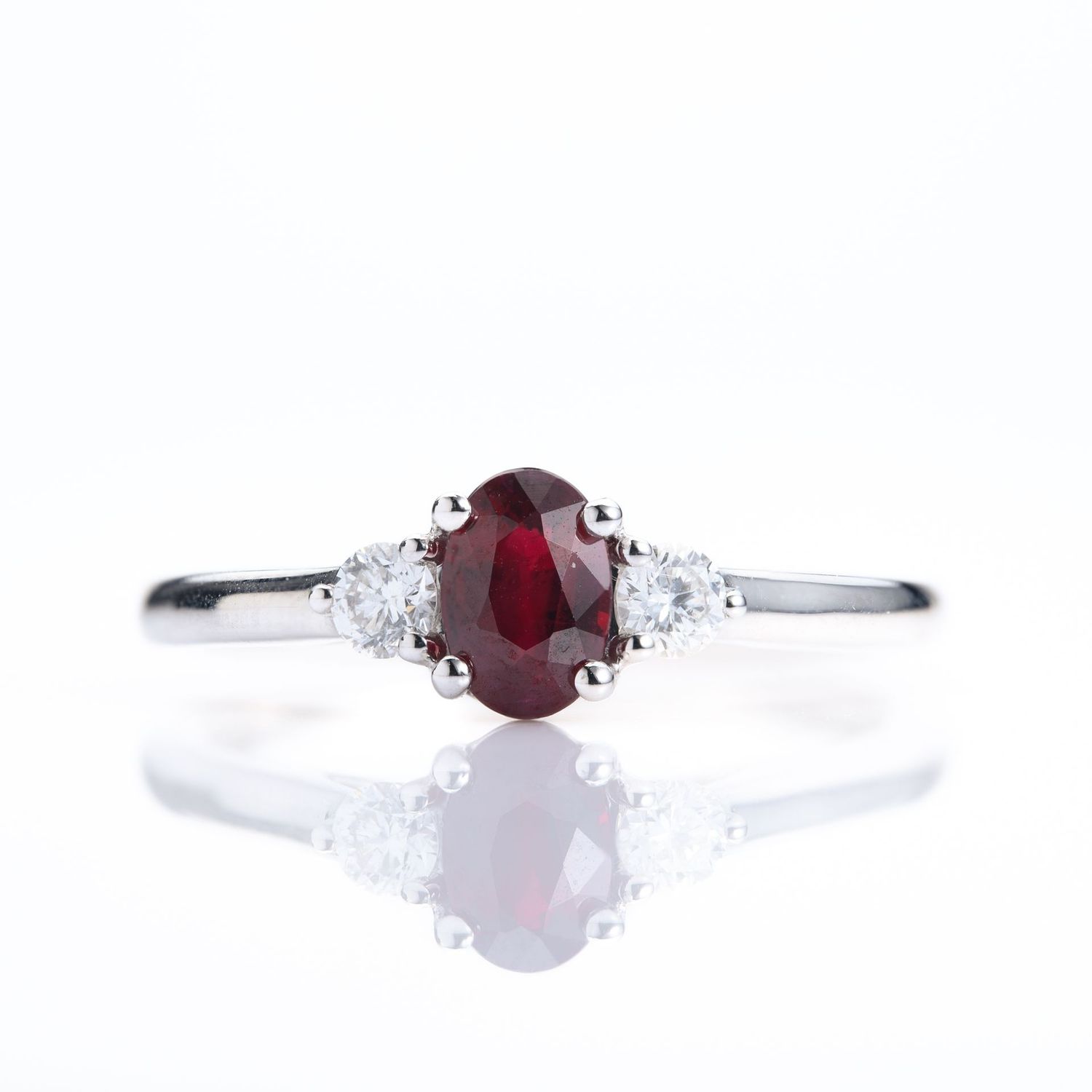 Platinum Oval Cut Ruby & Round Brilliant Cut Diamond Trilogy Ring