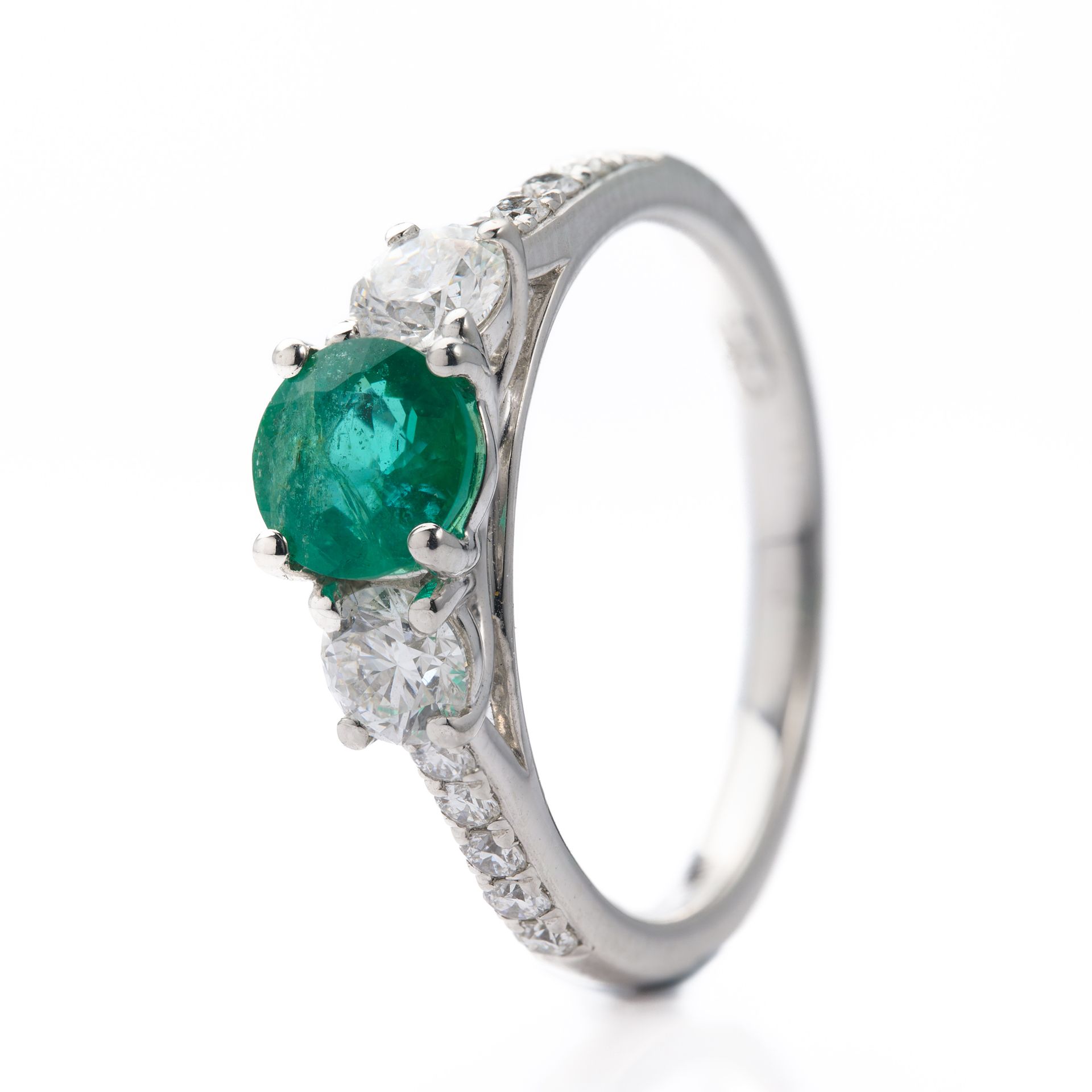 Platinum Round Cut Emerald & Round Brilliant Cut Diamond Trilogy Ring with Diamond Shoulders