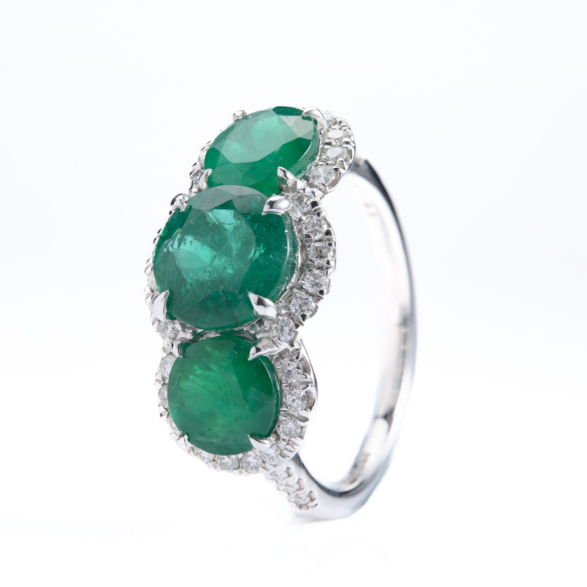 Platinum Round Cut Emerald & Round Brilliant Cut Diamond Triple Halo Cluster Ring