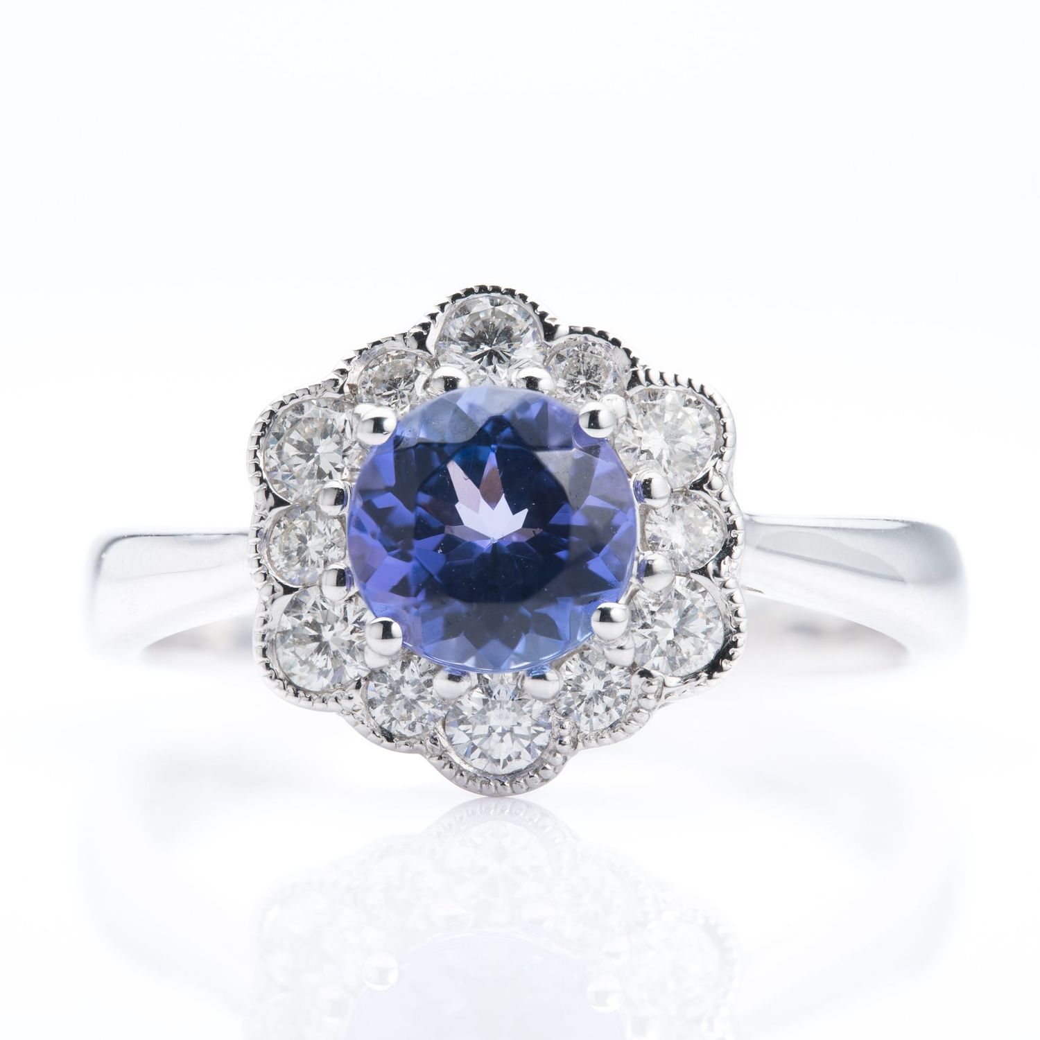 Platinum Round Cut Tanzanite & Round Brilliant Cut Diamond Cluster Ring