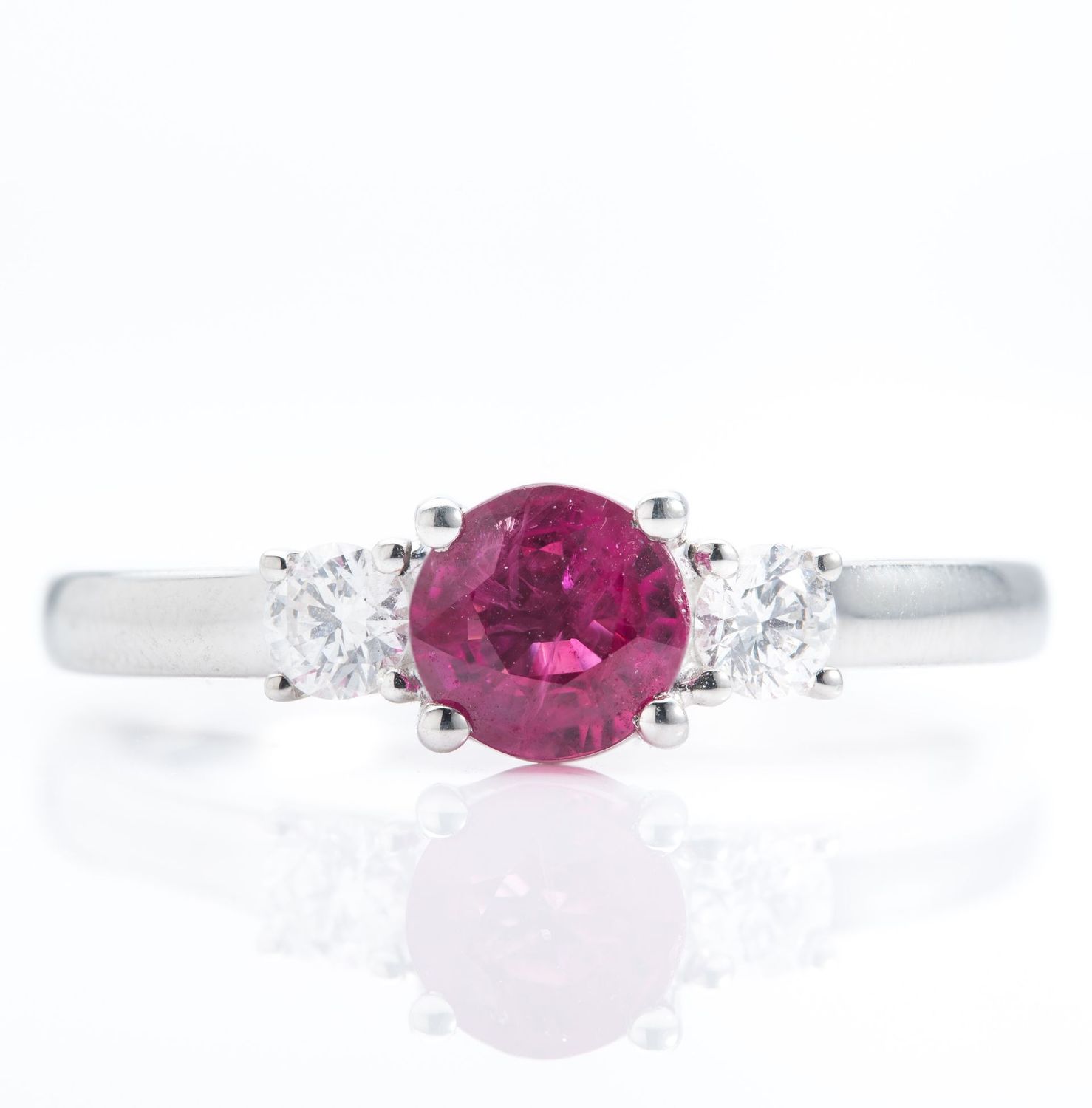 Platinum Round Cut Ruby and Brilliant Cut Diamond Trilogy Ring