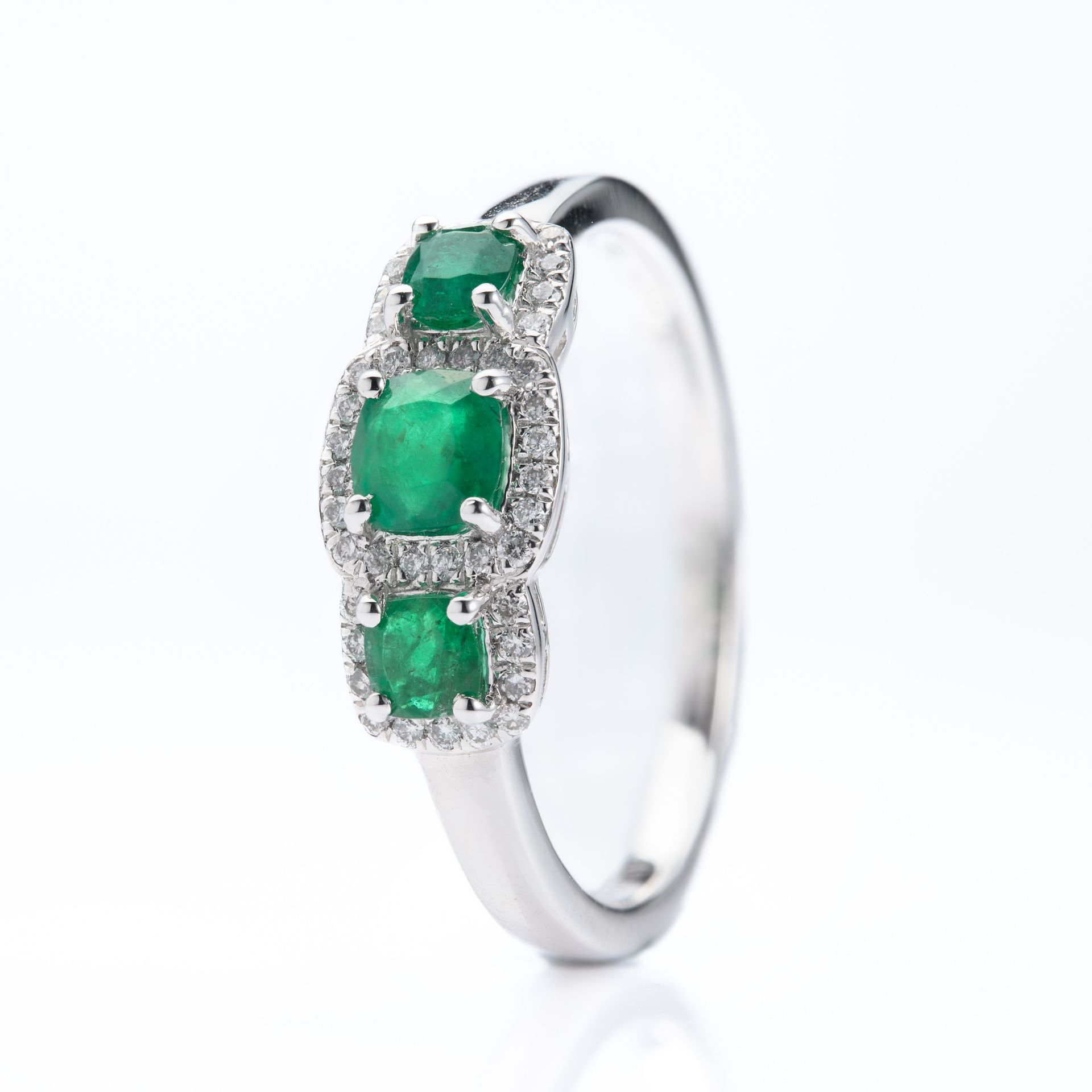 Platinum Round Cut Emerald & Round Brilliant Cut Diamond Triple Halo Cluster Ring
