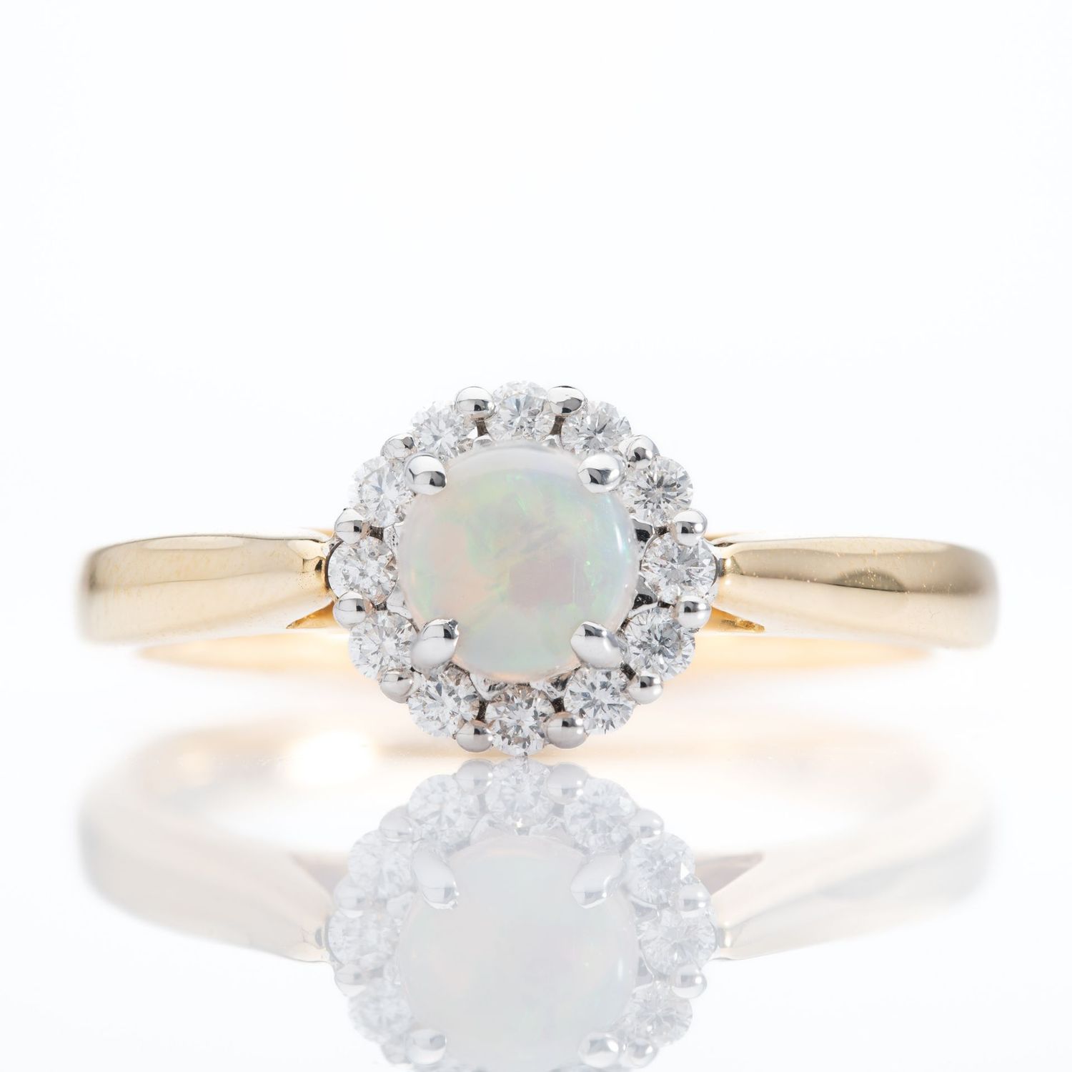 18ct Gold Opal & Diamond Halo Cluster Ring 18ct Gold Opal & Diamond Halo Cluster Ring