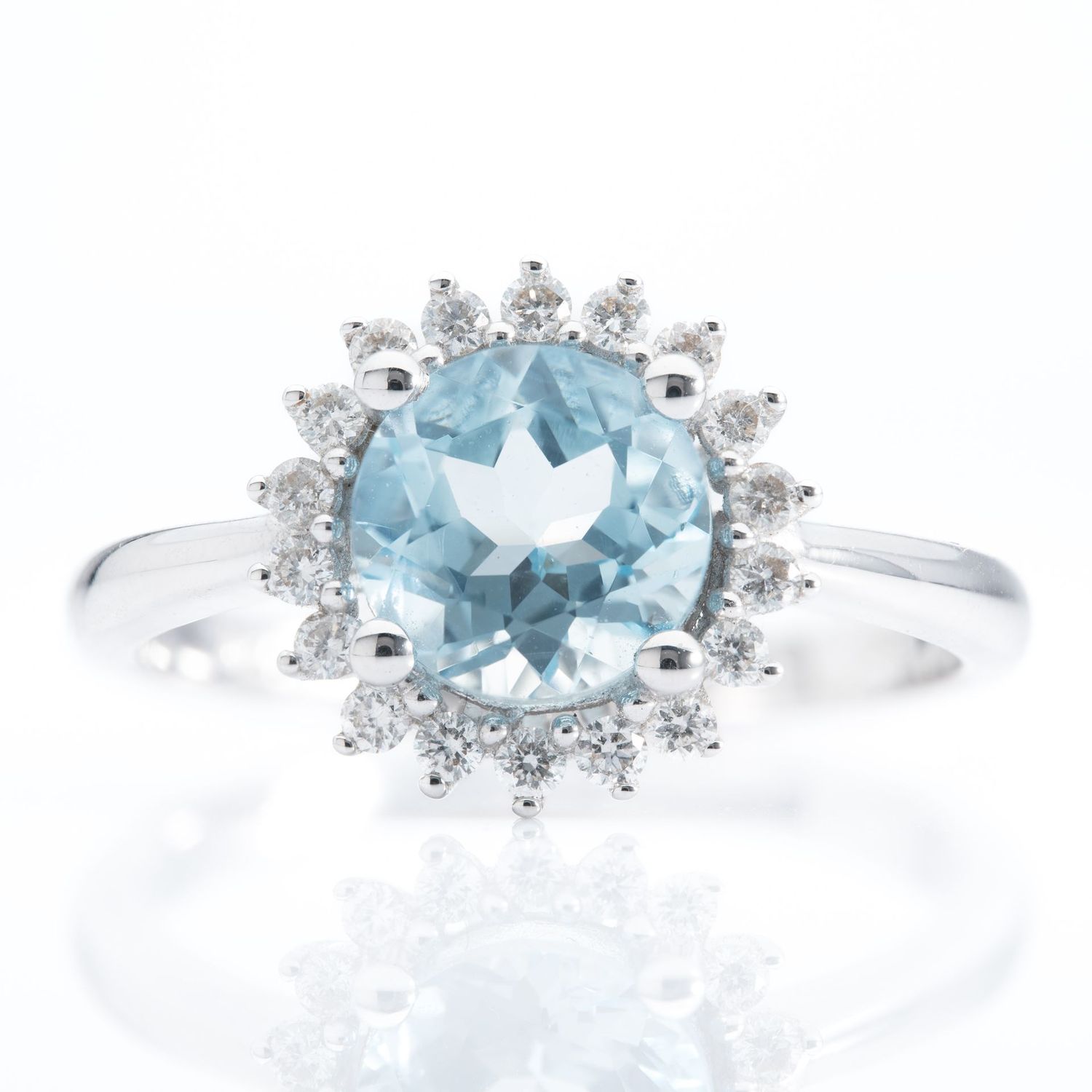 18ct White Gold Aquamarine and Diamond Starburst Cluster Ring 18ct White Gold Aquamarine and Diamond Starburst Cluster Ring