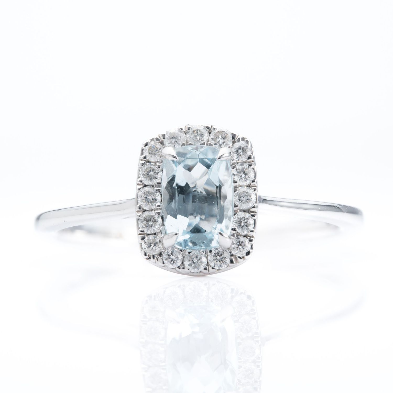 9ct White Gold Emerald cut Aquamarine and Diamond Halo ring 9ct White Gold Emerald cut Aquamarine and Diamond Halo ring