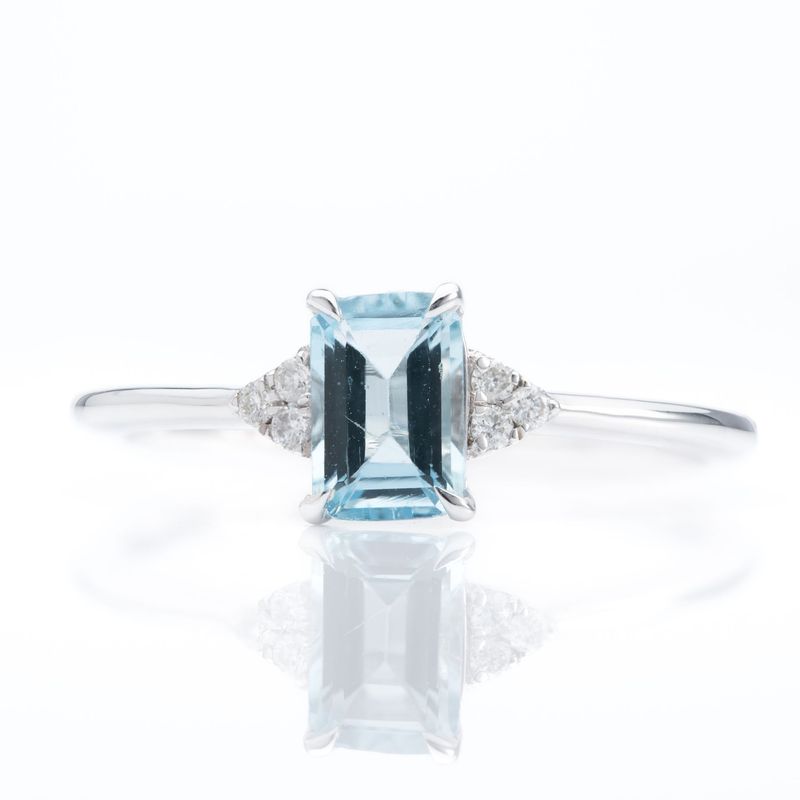 9ct White Gold Emerald cut Aquamarine and Diamond Trefoil shoulder Ring