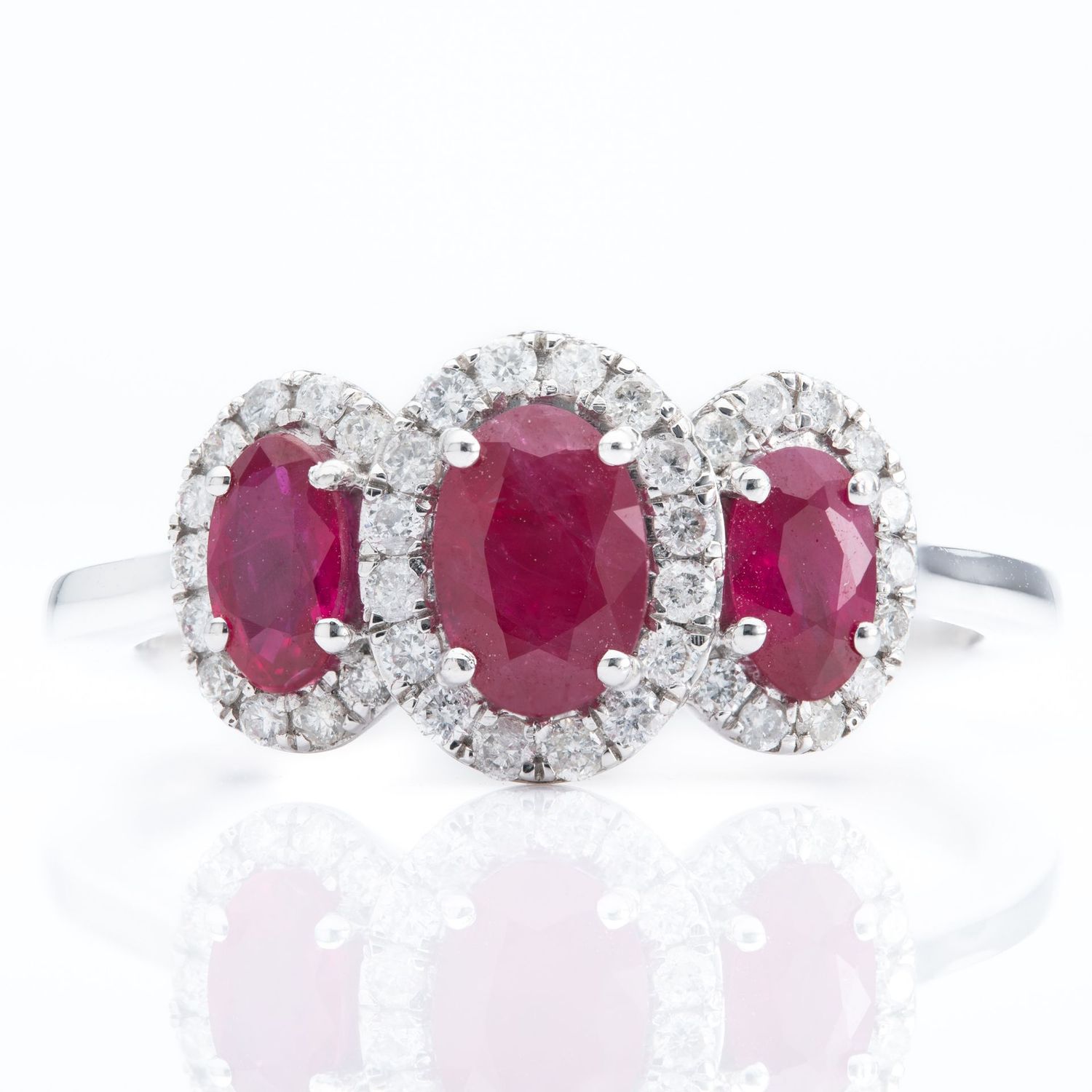 Platinum Oval Ruby & Diamond Triple Halo Cluster Ring