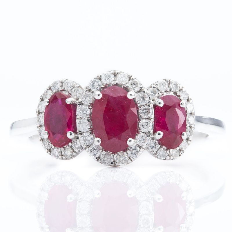 Platinum Oval Ruby & Diamond Triple Halo Cluster Ring