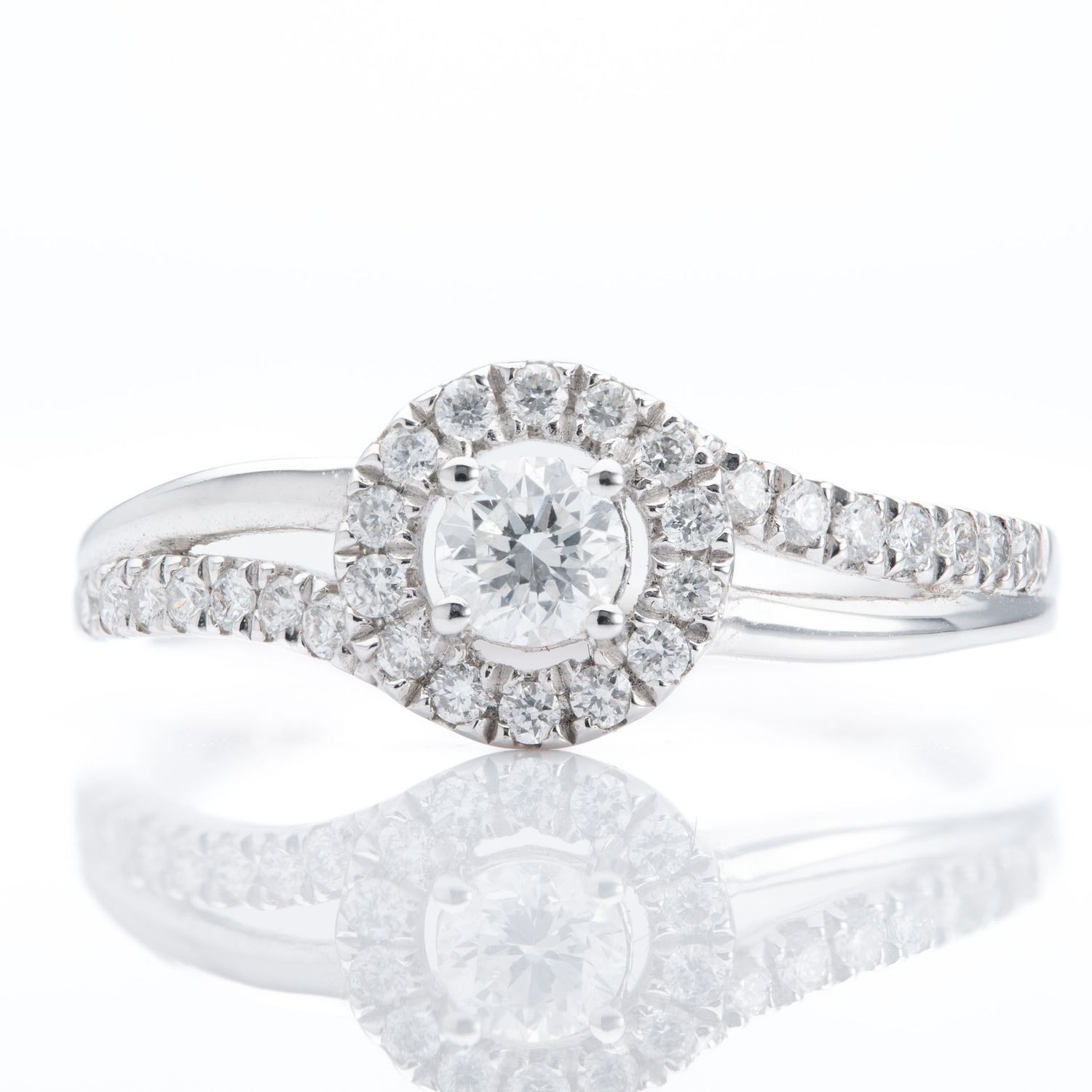 Platinum Twist Round Brilliant Cut Diamond Halo cluster Ring Platinum Twist Round Brilliant Cut Diamond Halo cluster Ring