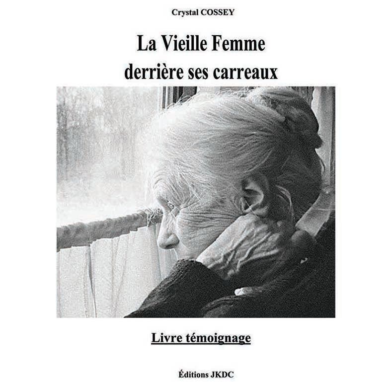 LA VIEILLE FEMME DERRIÈRE SES CARREAUX