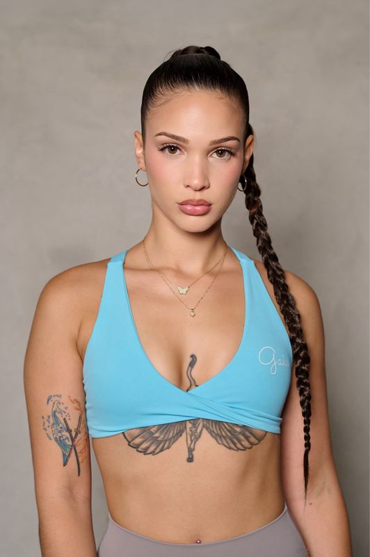 TURQUOISE FRONT TWIST/ CROSS BACK SPORTS BRA