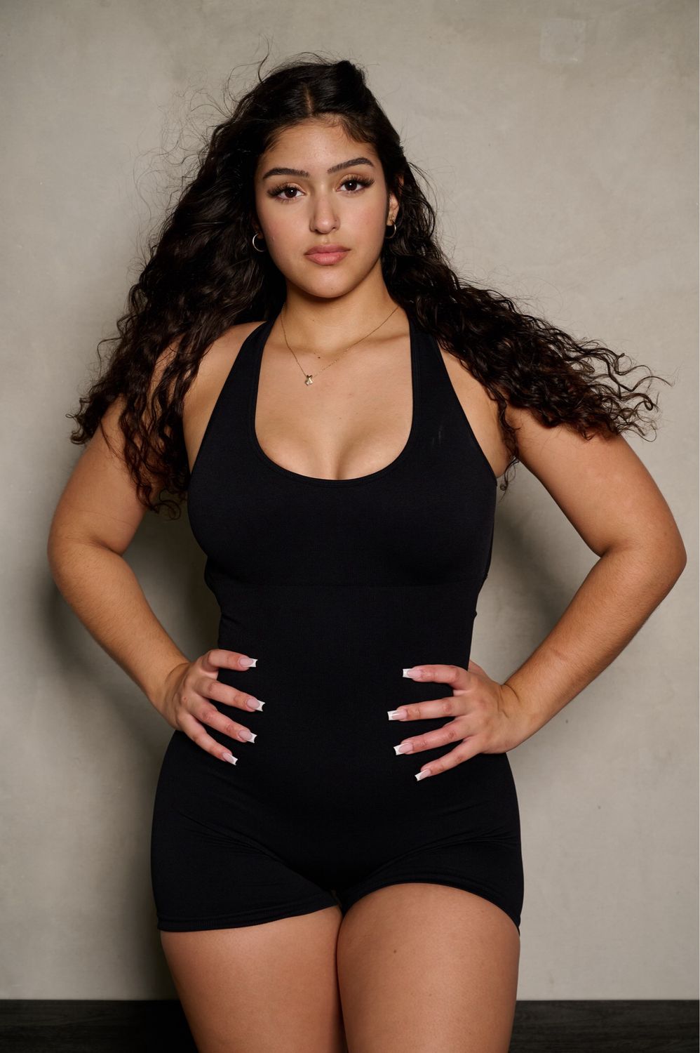BLACK SLEEVELESS FORM FITTING ROMPER