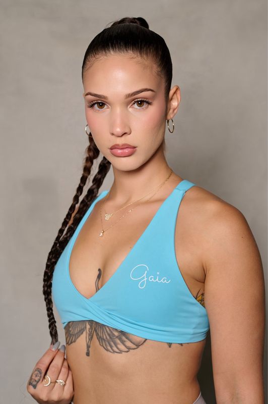 TURQUOISE FRONT TWIST/ CROSS BACK SPORTS BRA
