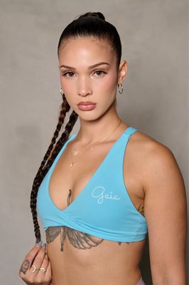 TURQUOISE FRONT TWIST/ CROSS BACK SPORTS BRA