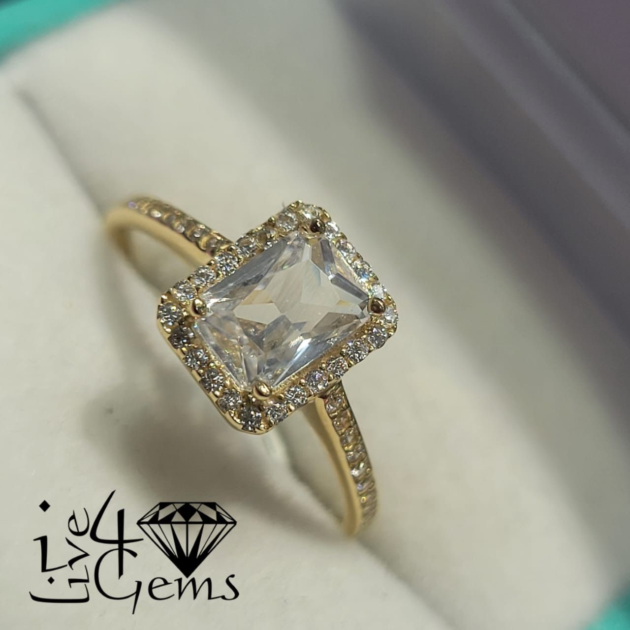 10kty Emerald Cut CZ Halo Ring