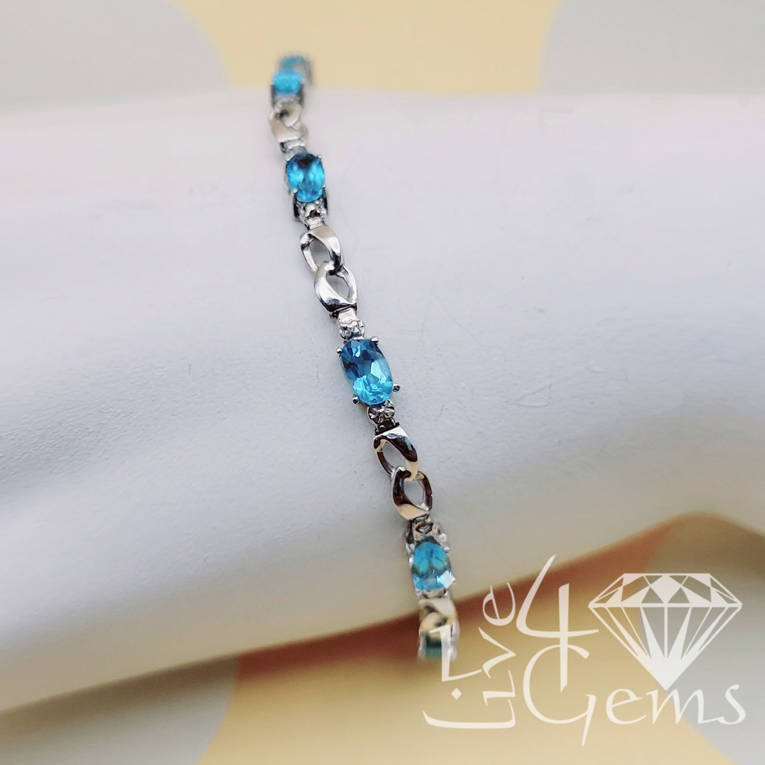 10ktw 2.3ctw Blue Topaz 0.02 Dia Bracelet