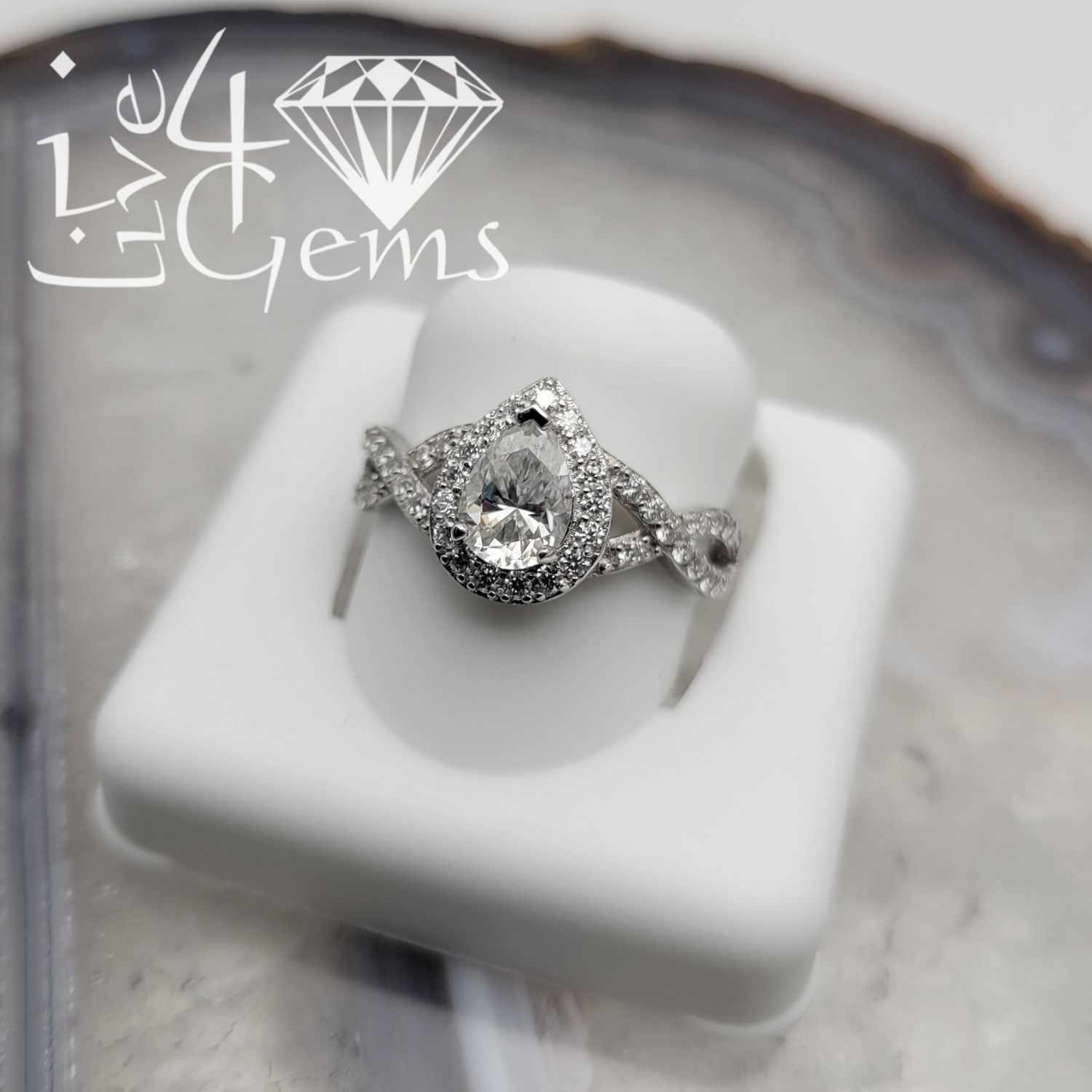 Silver Moissanite 1.25ctw Pear Twisted Band S7