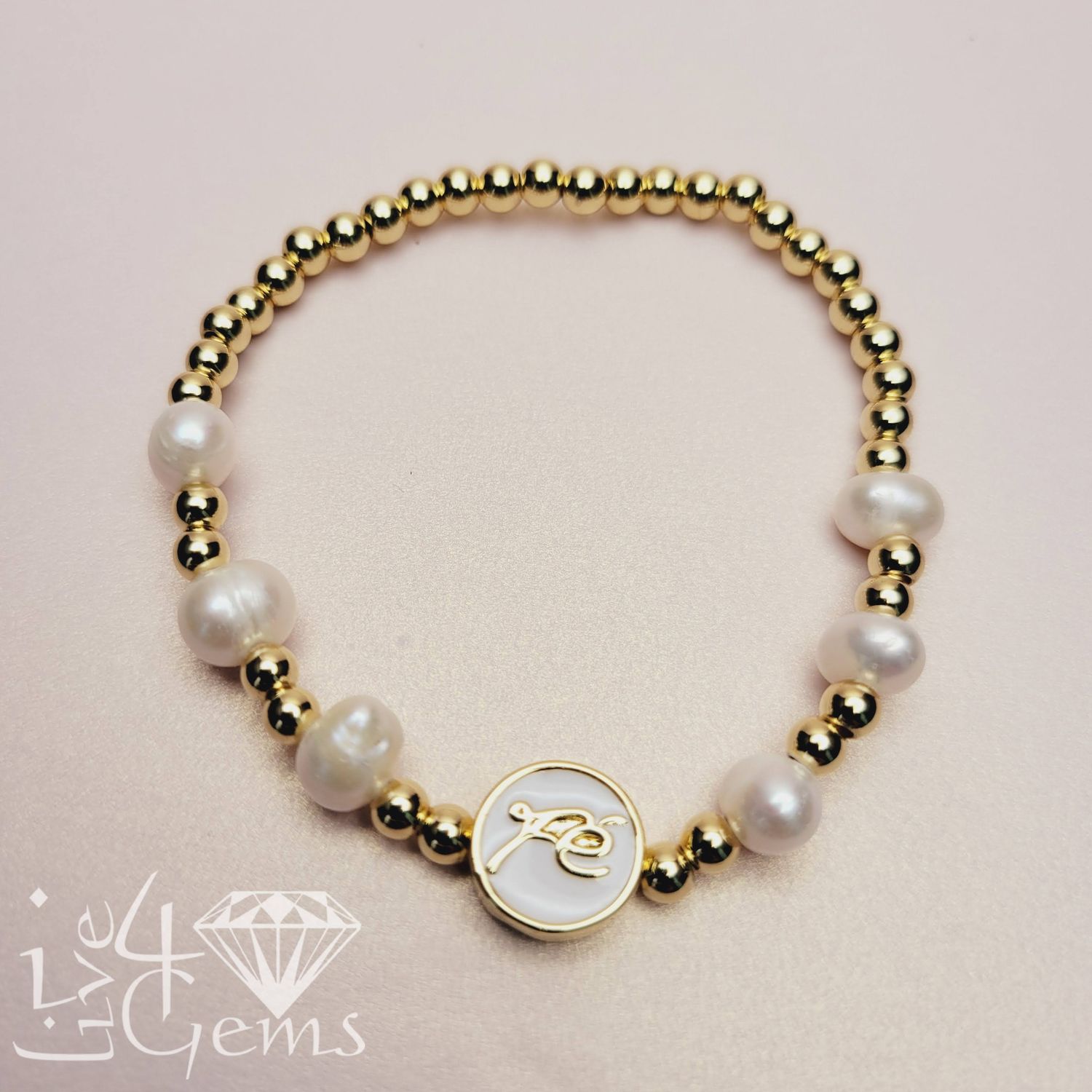 Pearl Stretch Stainless Steel Bracelet, Symbol: Fe- Faith, Colour: Yellow Tone