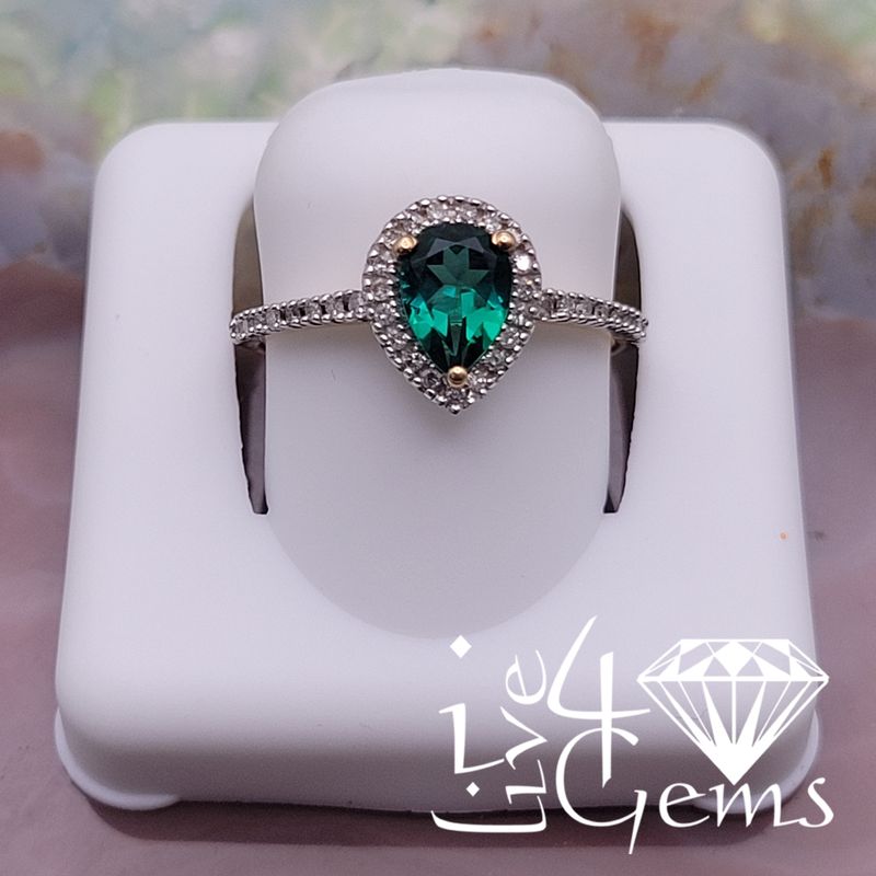 10ktw 1/6ctw Diamond 3/4ct Lab Emerald Pear Ring