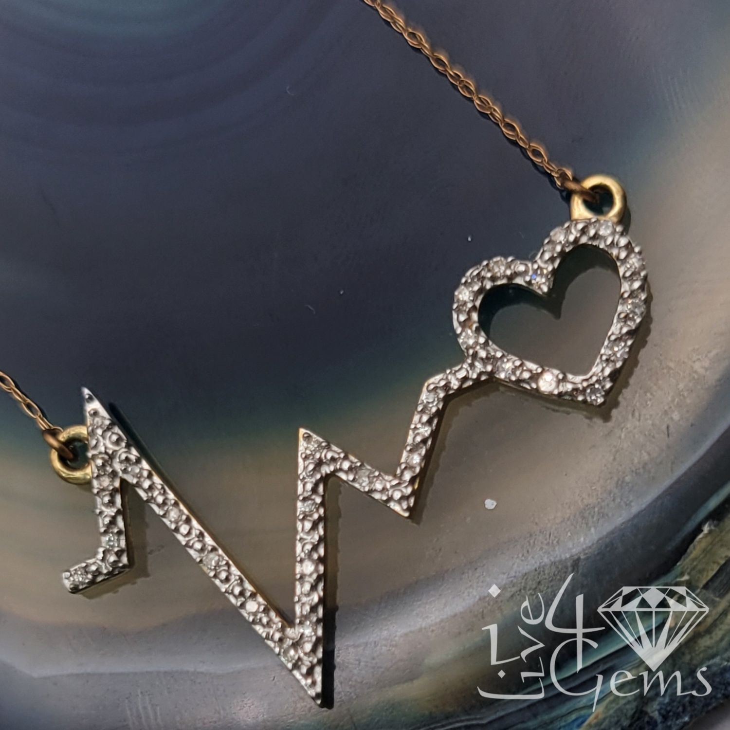 10kty 1/10ctw Dia Heart Beat Necklace