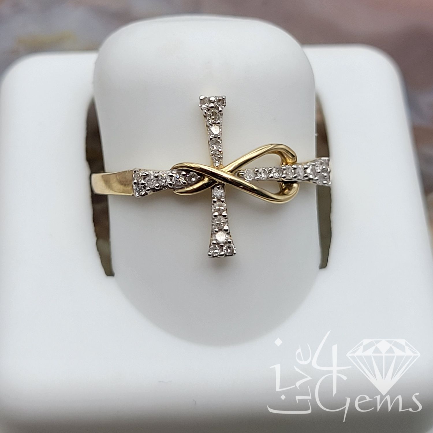10kty 1/10ct Diamond Infinity Cross Ring