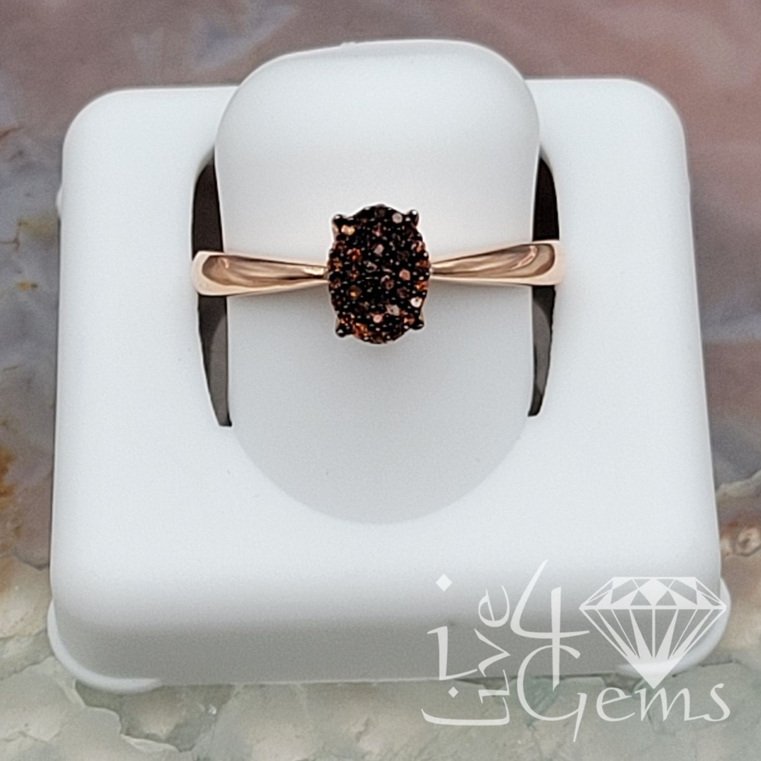10kt Rose 1/10ctw Red Oval Cluster Ring