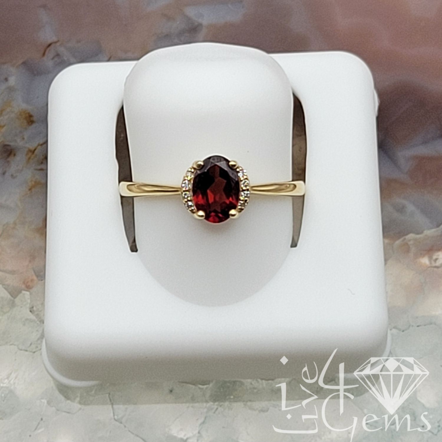 10kt Diamond and Garnet Oval Ring